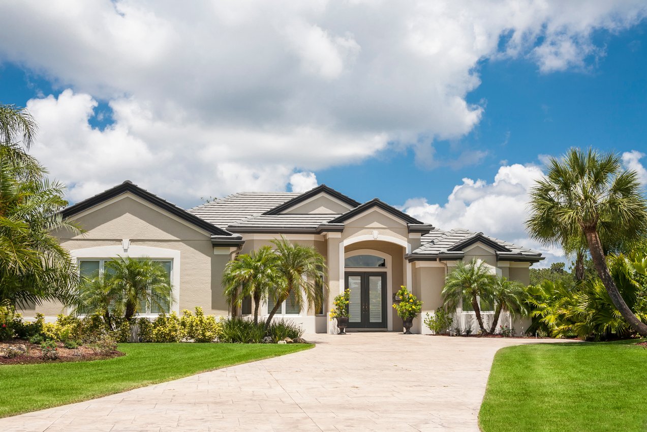 New Luxury Home with Palm Trees.